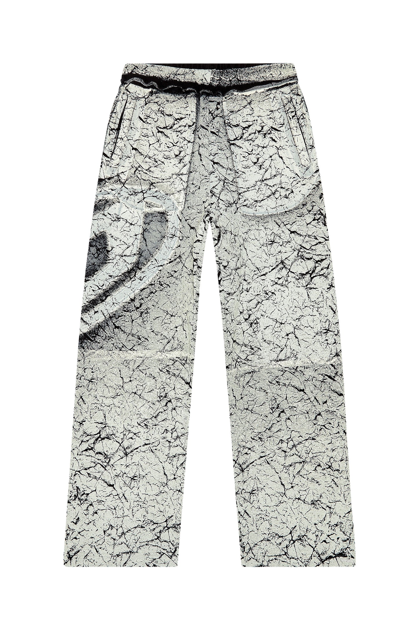 Track pants with cracked coating (4)