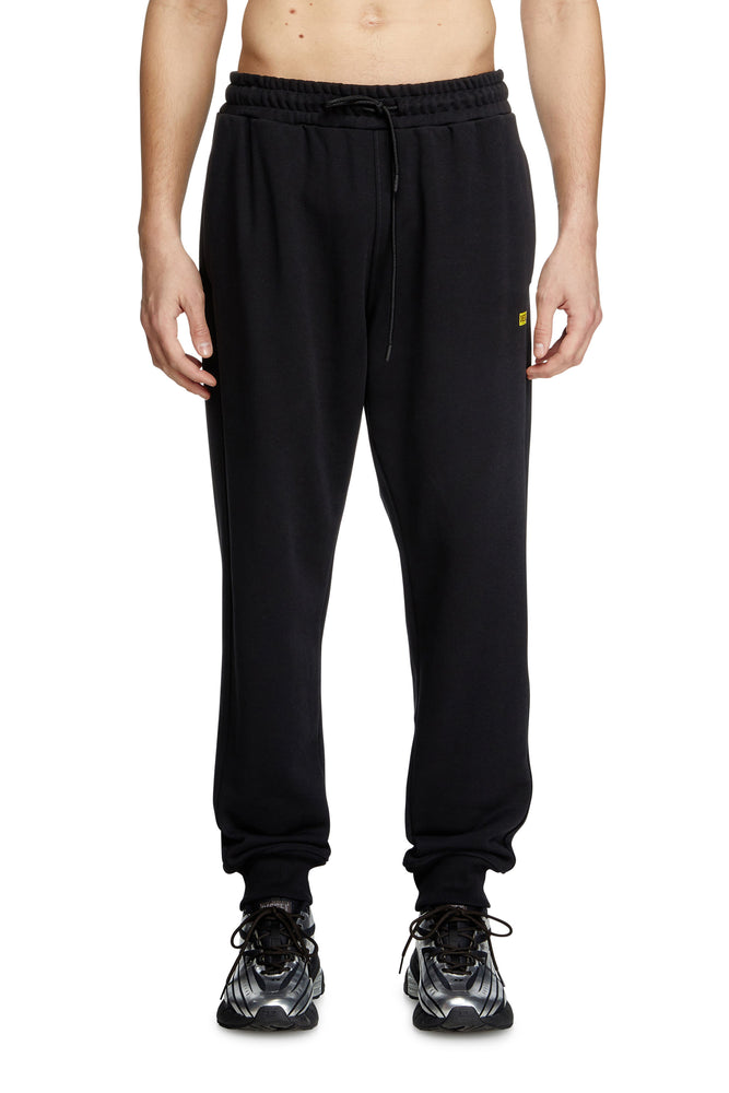 Track pants with small logo