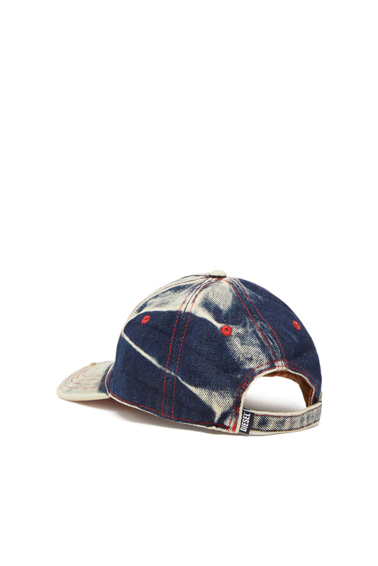 Baseball cap in treated denim (1)