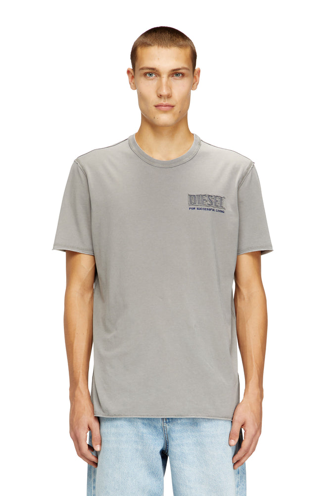 Acid-wash T-shirt with raw edges
